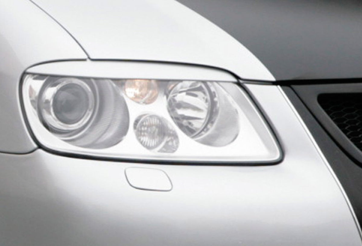 Scheinwerferblenden bis über Blinker passend für VW Caddy 2K